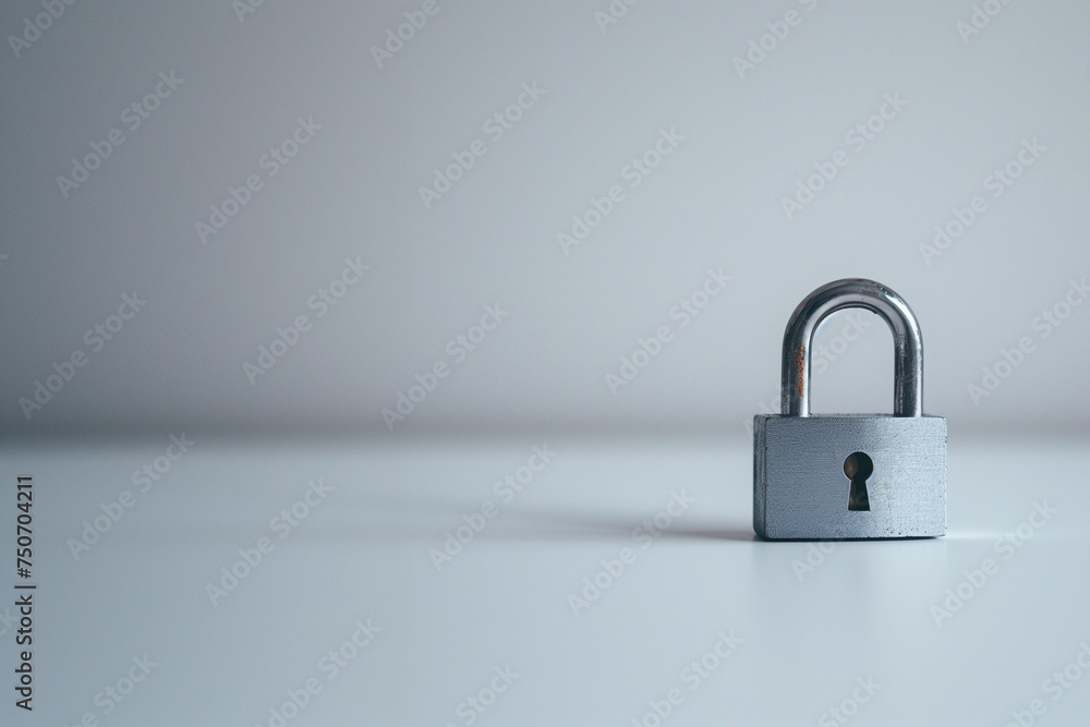 Metal padlock on a white background, copy space. Concept of security, protection and lock. Metal padlock on a white background, copy space. Concept of security, protection and lock.