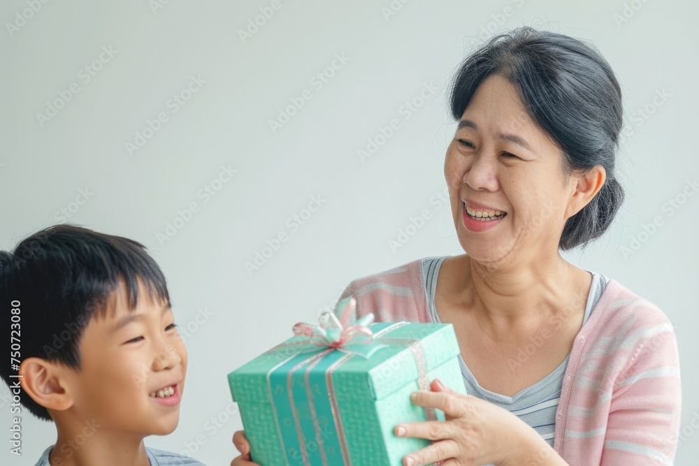 a son surprising his mother with a thoughtful gift, capturing the genuine happiness and gratitude a son surprising his mother with a thoughtful gift, capturing the genuine happiness and gratitude