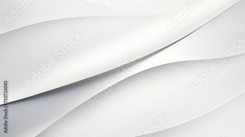 Minimalist, tone-on-tone image of curving lines embossed on pale gray paper © EAStevens