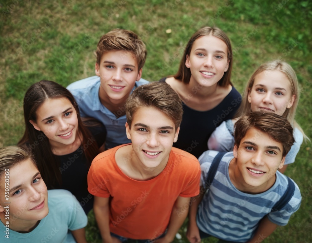 A group of young people are smiling and posing for a picture. Scene is happy and friendly A group of young people are smiling and posing for a picture. Scene is happy and friendly