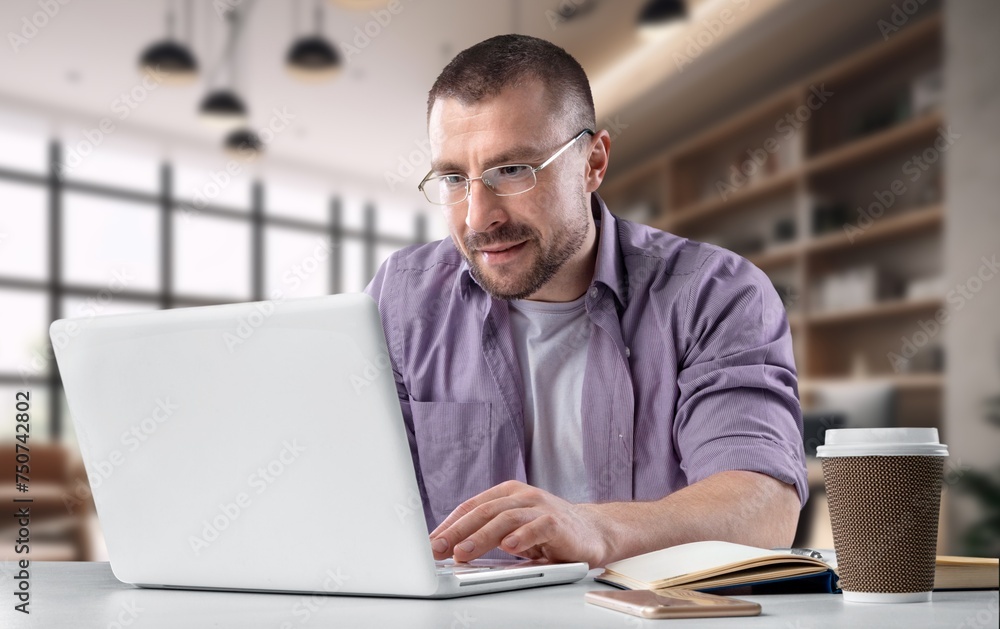 E-learning Focused guy looking at computer E-learning Focused guy looking at computer