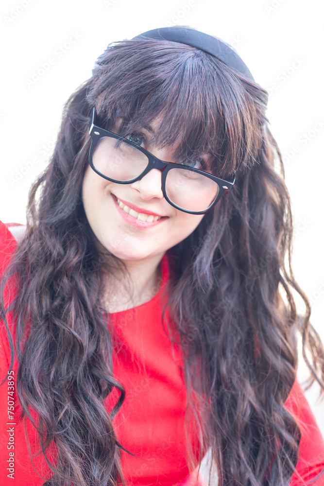 a woman wearing glasses and a red shirt is smiling