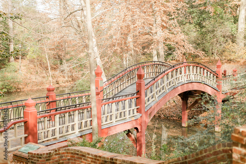 Walking bridge over water in the Fall.