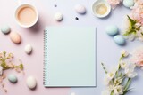 Open Notebook With Pastel Colored Eggs and Flowers