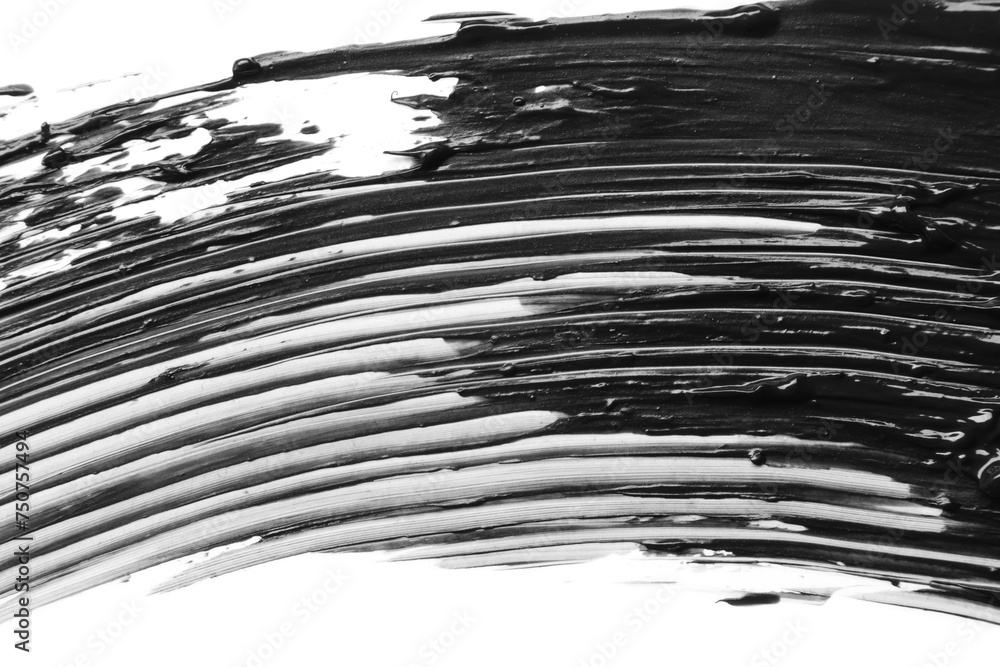 Smear of black mascara isolated on white, top view Smear of black mascara isolated on white, top view
