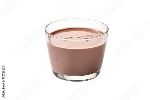 A Glass of Chocolate Milk. A clear glass filled with rich, creamy chocolate milk sits on a plain white background. The liquid is smooth and inviting, with a slight sheen on the surface.