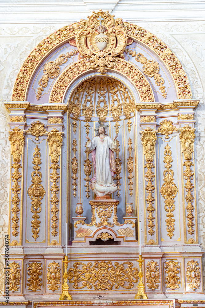 religious figure inside the Royal and parish church of São Pedro.