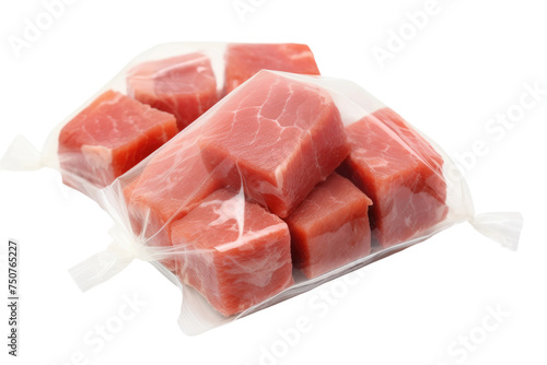 Bag of Raw Meat. A bag filled with raw meat is placed on a clean, white background. The meat is uncooked and appears fresh and potentially ready for cooking or storage.