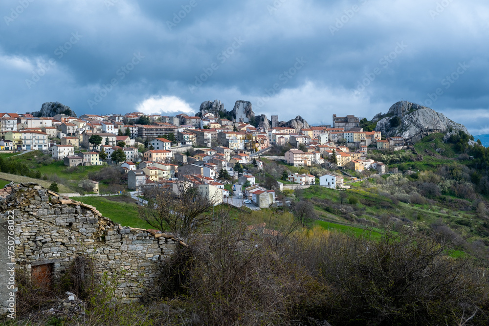 The medieval tower and the church in the village of Pietrabbondante. Isernia, Molise, Italy, Europe. The medieval tower and the church in the village of Pietrabbondante. Isernia, Molise, Italy, Europe.