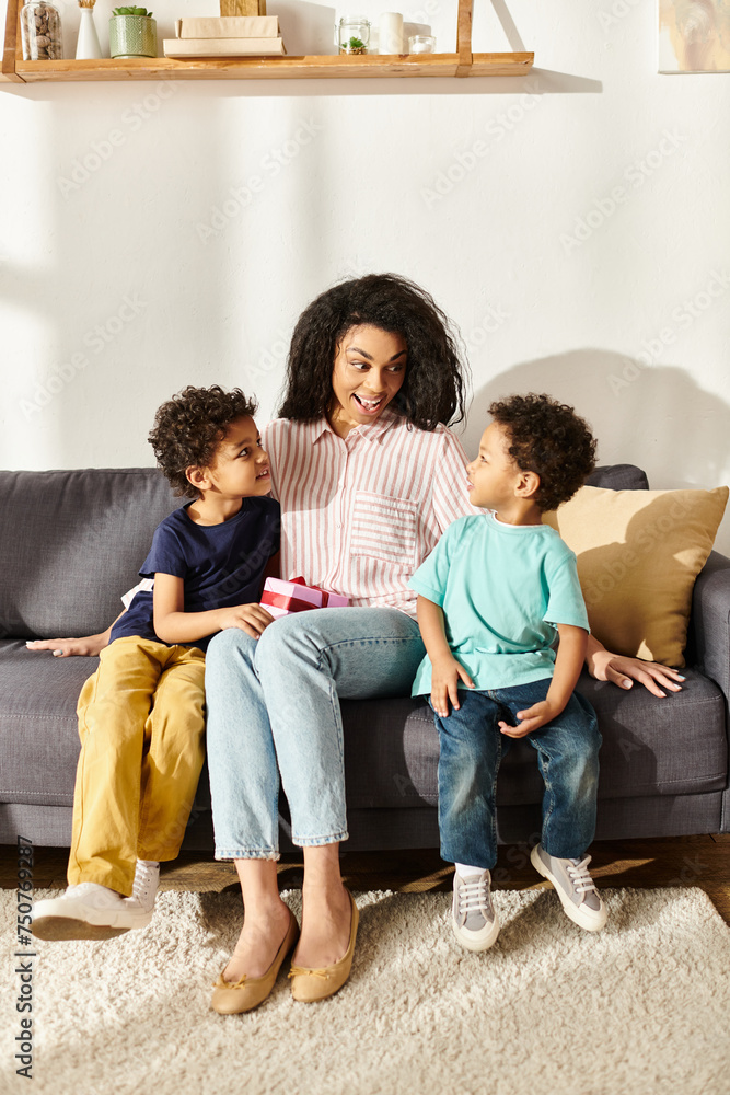 joyous beautiful african american woman in homewear spending time with her little sons, Mothers day joyous beautiful african american woman in homewear spending time with her little sons, Mothers day