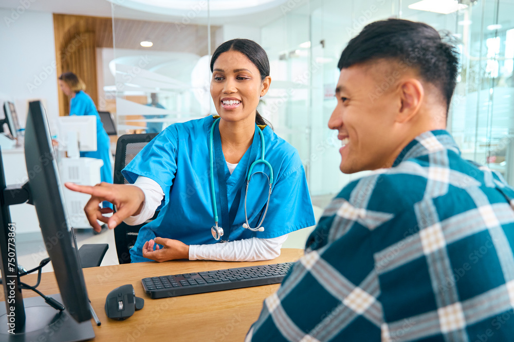 Obraz premium Female Nurse Or Doctor Wearing Scrubs At Hospital Appointment With Male Patient Looking At Computer