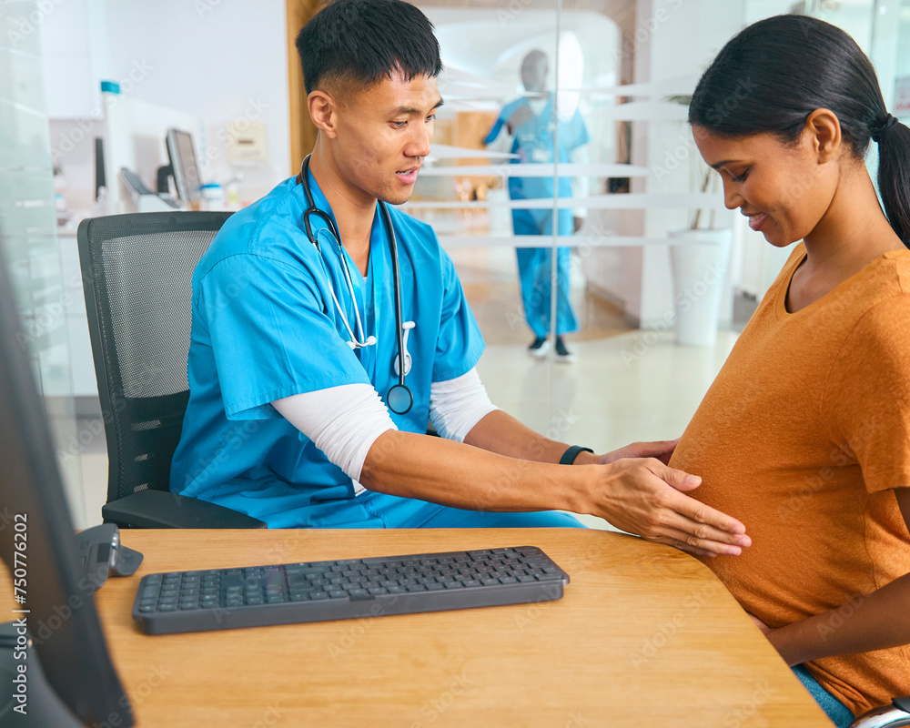 Obraz premium Male Nurse Or Doctor Wearing Scrubs Examining Pregnant Woman In Hospital Obstetrics Clinic