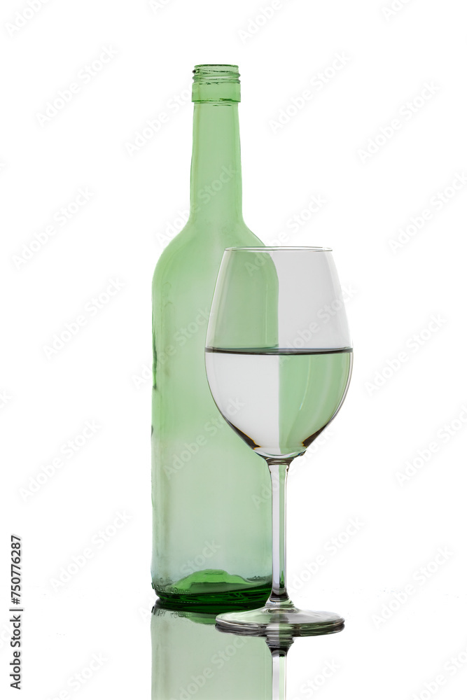 A colorful bottle with reflections in a wine glass
A colorful bottle with reflections in a wine glass