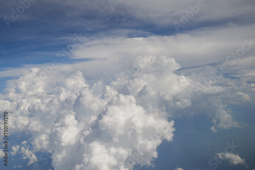 Fototapeta Naklejka Na Ścianę i Meble -  Aerial view seen over clouds from aircraft.