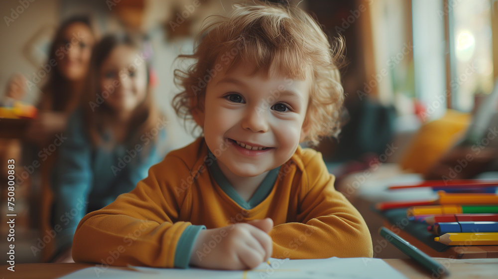 Portrait of happy child drawing with pencils Portrait of happy child drawing with pencils