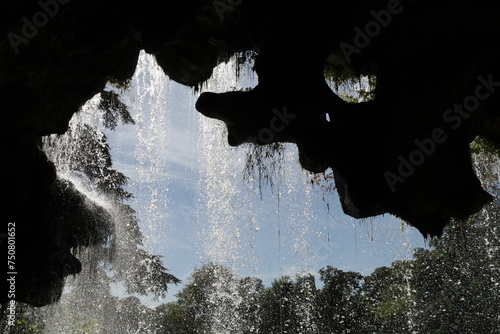 interior of a rocky waterfall cave in Vincennes park photo