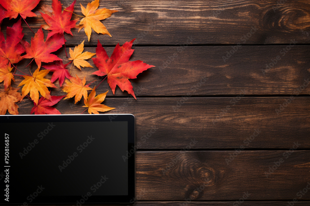 Laptop on a black wooden background with autumn leaves сreated with Generative Ai - obrazy, fototapety, plakaty 