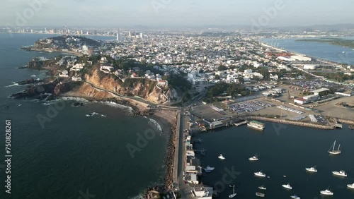 Drone fly above Mazatlan city in Mexico Sinaloa State revealing the port harbour photo