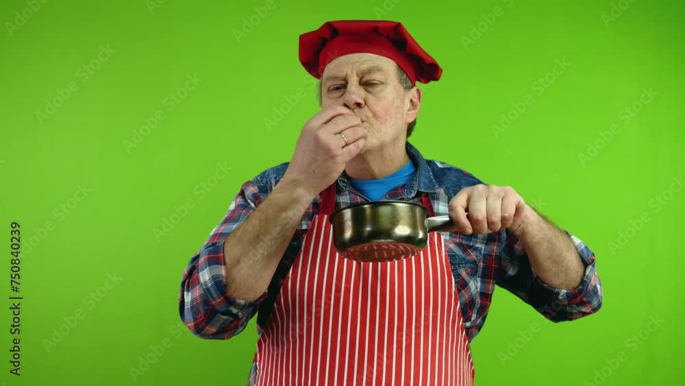 Chef smelling food aroma from stewpan enjoying. Chef smelling food aroma from stewpan enjoying.