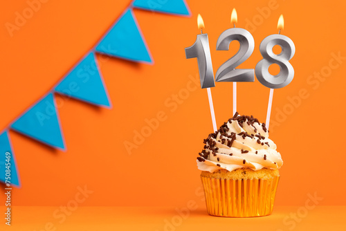 Candle number 128 - Cupcake birthday in orange background