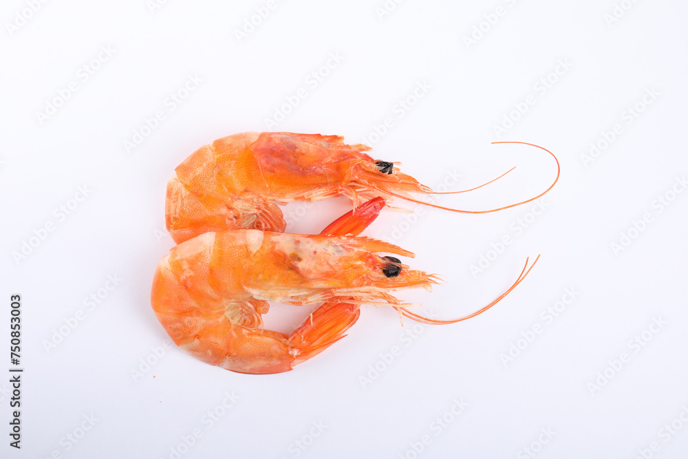 Delicious cooked shrimps isolated on white, top view