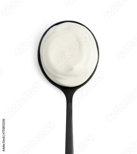 One black spoon with mayonnaise isolated on white, top view