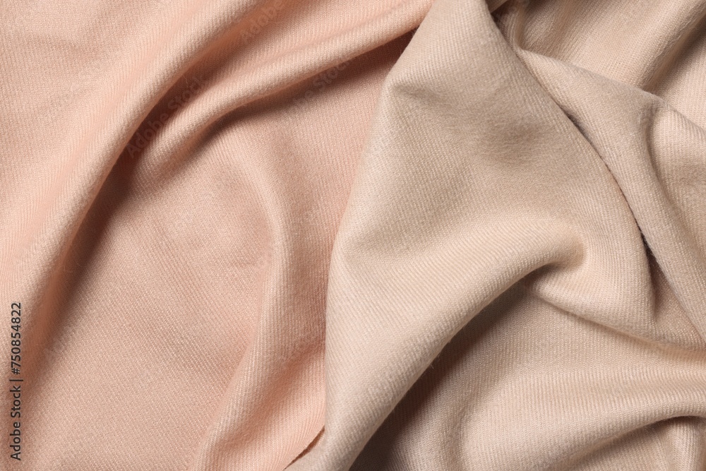 Texture of beige crumpled fabric as background, top view Texture of beige crumpled fabric as background, top view