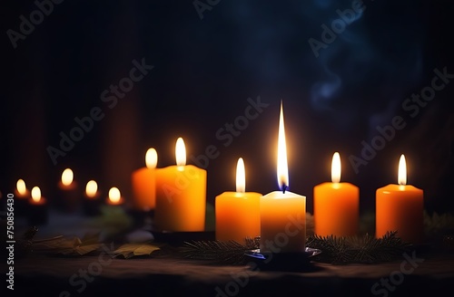  Walpurgis Night. Magic burning candles on glowing dark natural Walpurgis Night. background. mysterious fairy scene. witchcraft ritual. dark natural Background. Samhain, Halloween holiday concept