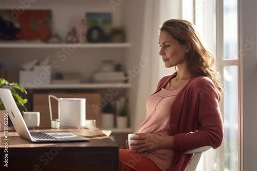 Expectant Mother Working from Home. Pregnant professional woman comfortably working on her laptop from a cozy, sunlit home office.