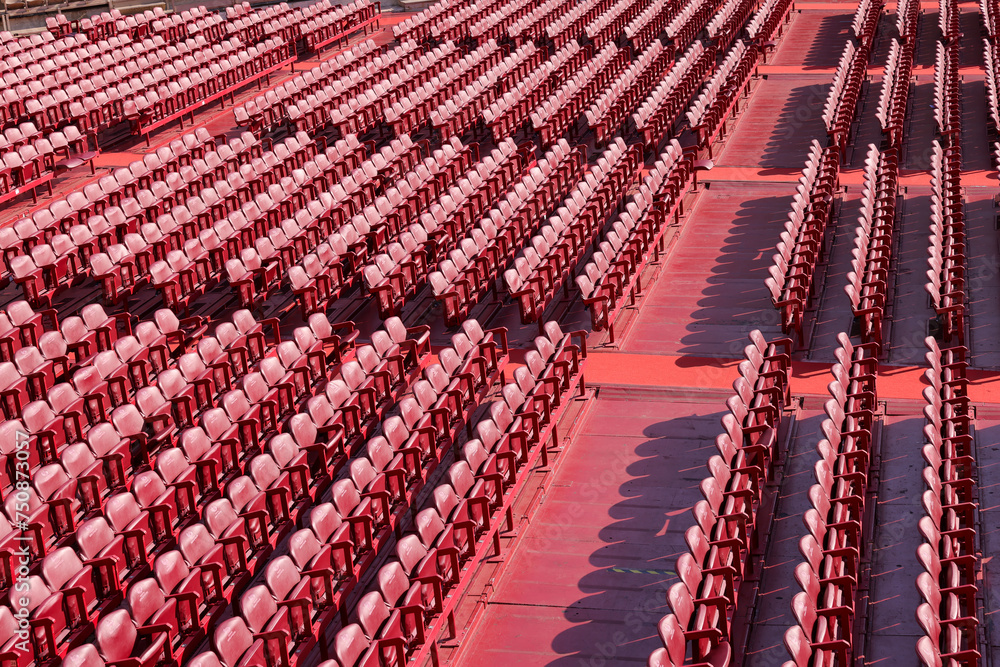 Fototapeta premium rows of red chairs in the arena di Verona