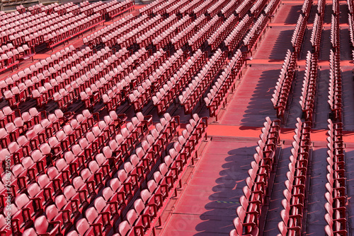 rows of red chairs in the arena di Verona photo