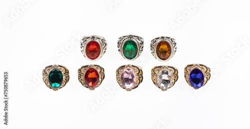 set of rings with precious colored stones isolated on white background