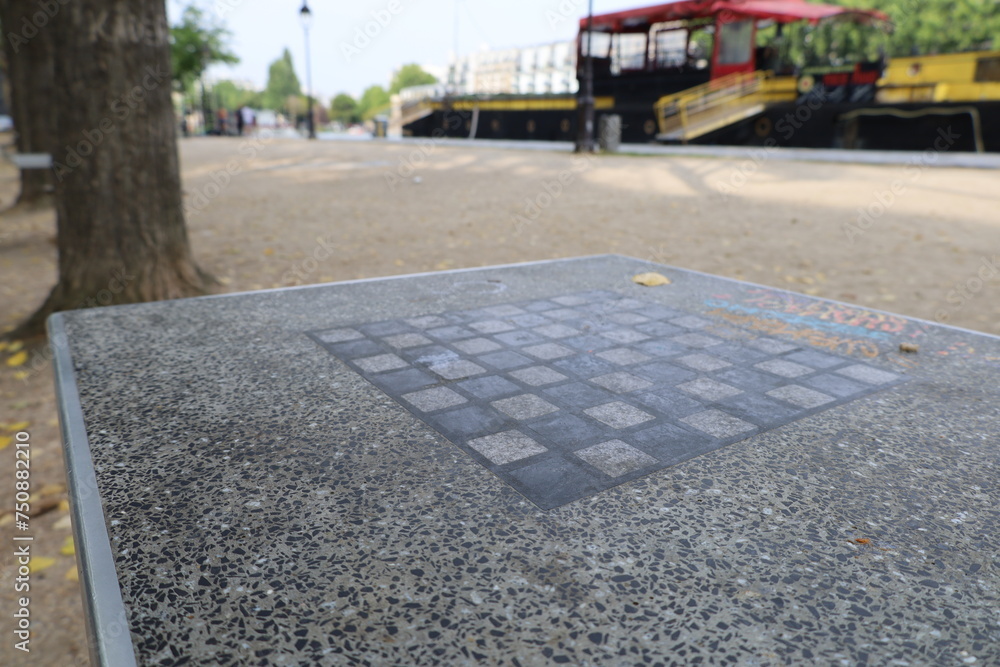Fototapeta premium public street chess game table in Paris, France