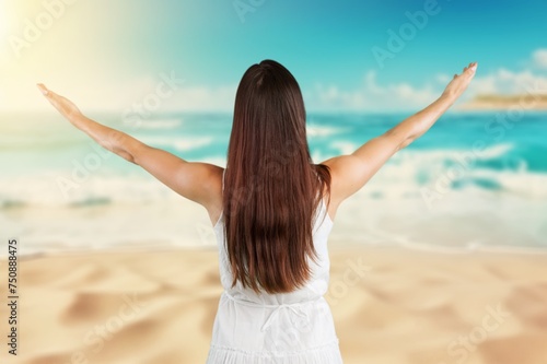 Woman tourist at sea beach background