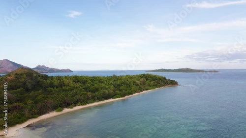 Aerial 4k view cinematic over Marcilla beach Coron, The Philippines. Beautiful scenic tropical beaches, mangroves, and turquoise waters photo