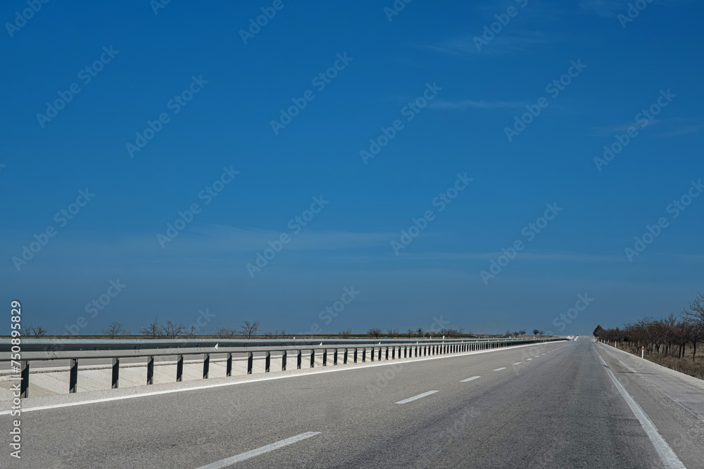 Asphalt road with lanes. Photo of a long distance journey. Travelling from Konya to Ankara.