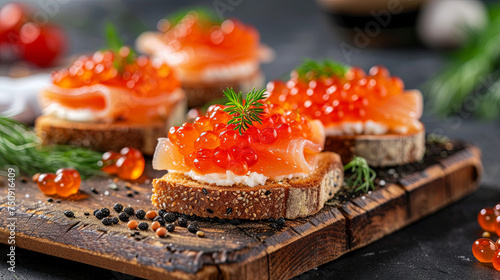 A sandwich featuring both red and black caviar, elegantly displayed on a wooden board