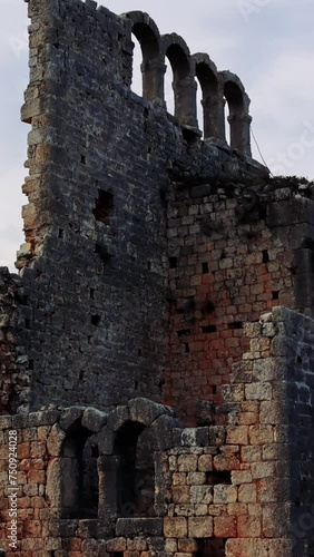 Okuzlu site spans Hellenistic to Byzantine times, featuring archaeological old ruin of a three-nave basilica. Explore archaeological old ruin, history through archaeological old ruin photo