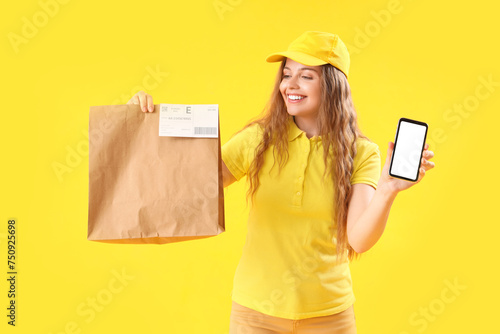 Female courier with paper b...