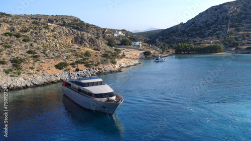Luxury yacht anchored in Aegean island bay, Greece