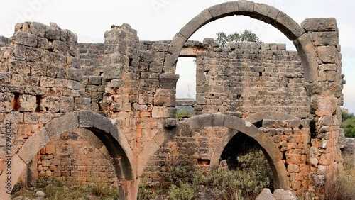 Okuzlu, Hellenistic to Byzantine, highlights history, travel with three-nave basilica. Ideal for history, travel enthusiasts, exploring history, travel in ancient settings photo