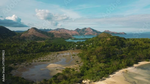 Aerial 4k view cinematic over Marcilla beach Coron, The Philippines. Beautiful scenic tropical beaches, mangroves, and turquoise waters photo