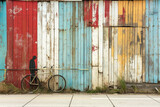 photo on vintage old bike on a colorful wall with a man shadow