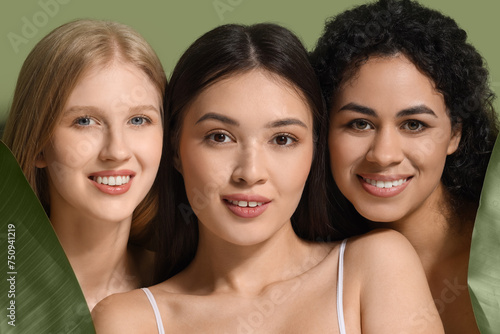 Beautiful young women with palm leaves on green background, closeup