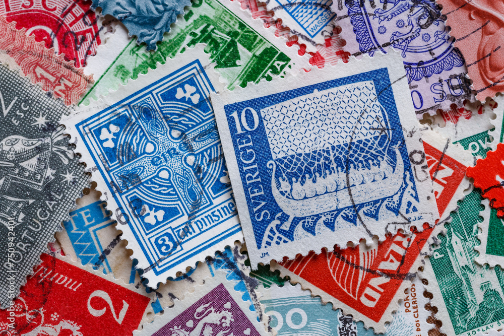 Ukraine, Kiyiv - January 12, 2023 Ireland Postage stamps..Postage stamps.A collection of world stamps in a pile.Postage stamps from different countries and times