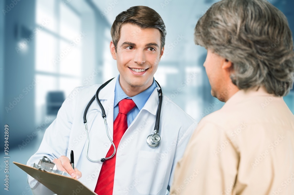 doctor consulting patient in clinic setting doctor consulting patient in clinic setting