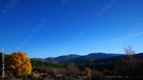 Autumn Landscape with Blue Sky and Rolling Hills