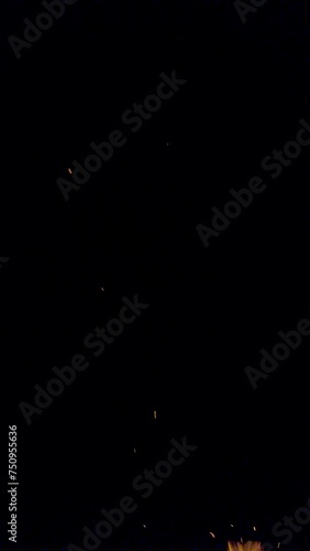  Black night and orange fire sparks - Fireplace campfire