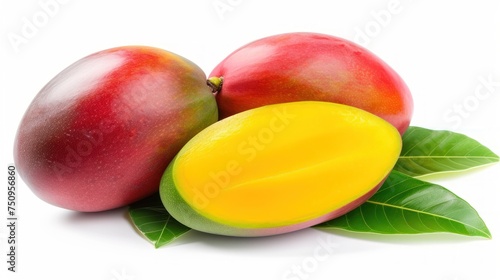 a couple of mangoes sitting next to each other on top of a leafy green leafy branch on a white background. photo