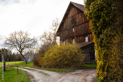Wooden barn, rural architecture in Germany. Spring